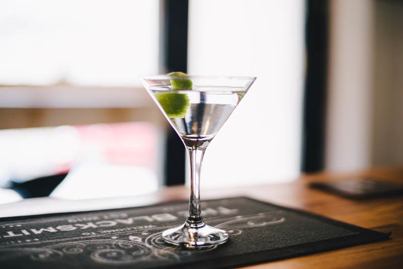 cocktail glass on mat